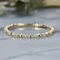 Gouden minimalistische ring met kleine zirkonia