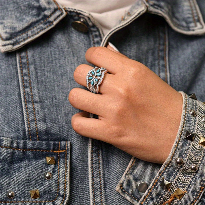 Zilveren ring met turquoise blaadjes en zirkonia