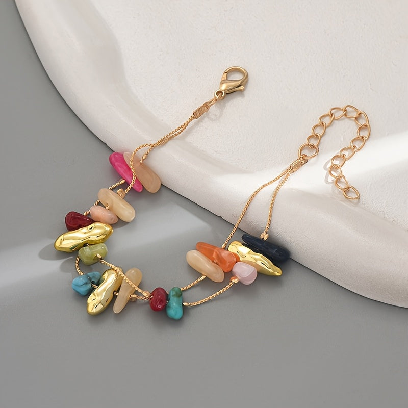 Gouden armband met kleurrijke natuursteen chips