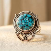 Zilveren ring met turquoise edelsteen en filigrein