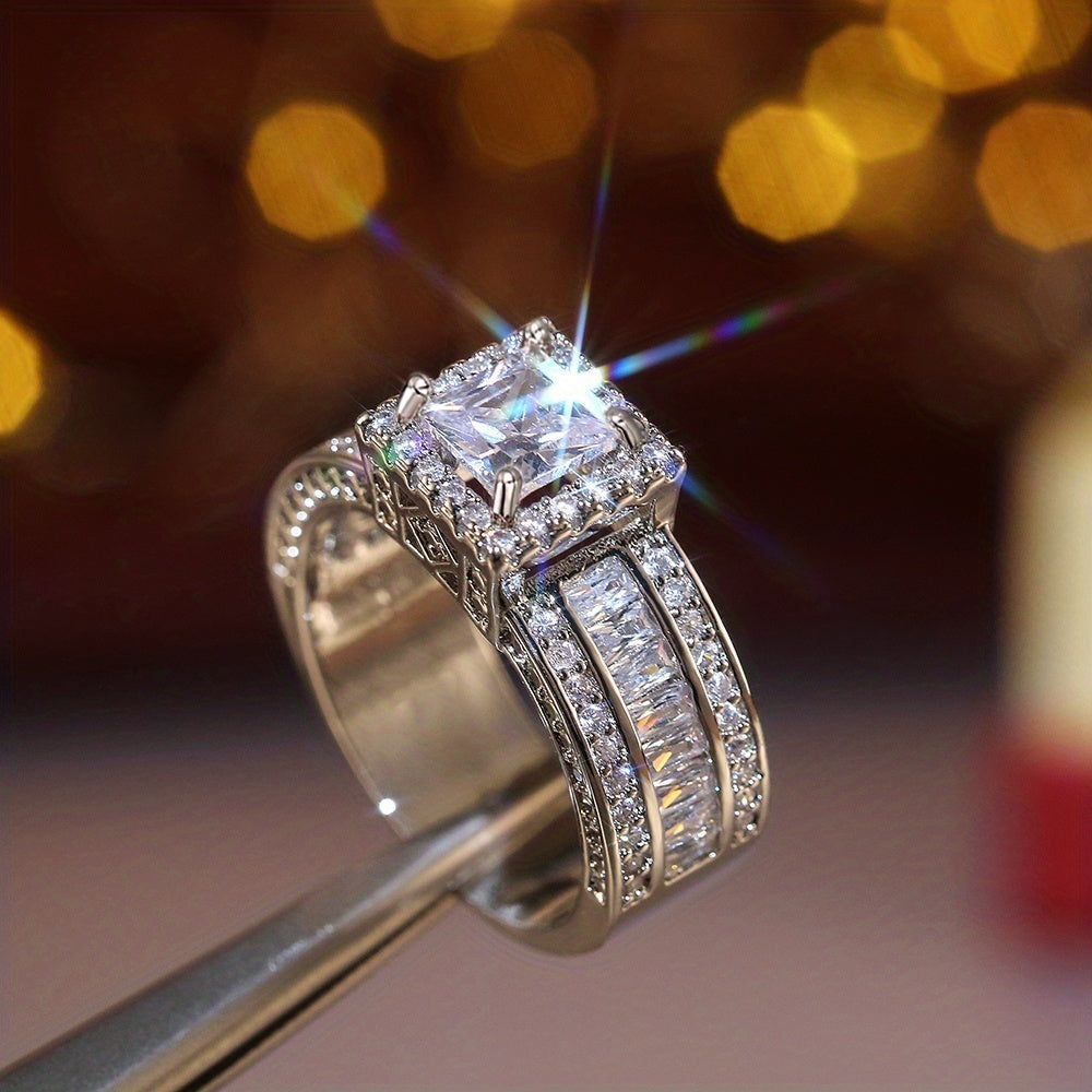 Zilveren halo ring met prinses geslepen zirkonia
