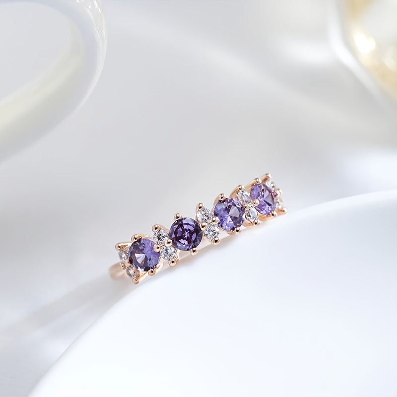 Roségouden ring met paarse en witte zirkonia