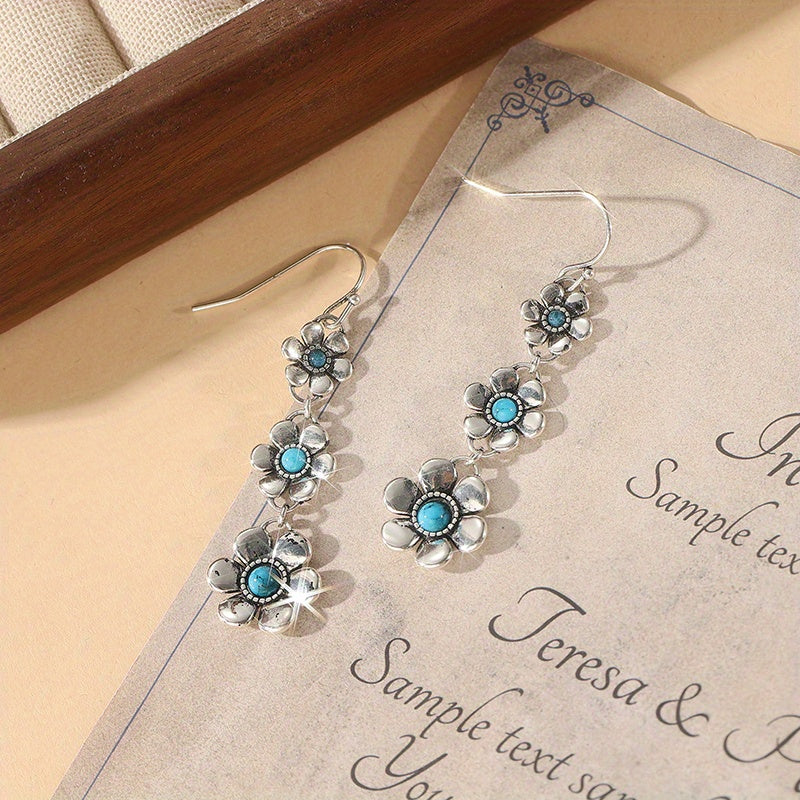 Zilveren bohemian bloemenoorbellen met turquoise