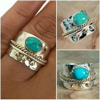 Zilveren brede ring met turquoise en goudaccenten