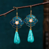 Vintage oorbellen met turquoise bloem en druppelhanger