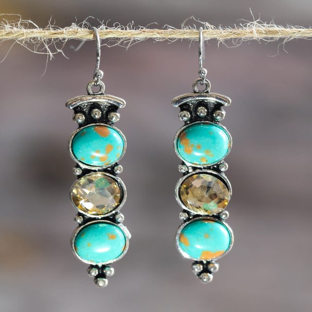 Zilveren bohemian oorbellen met turquoise en citrien