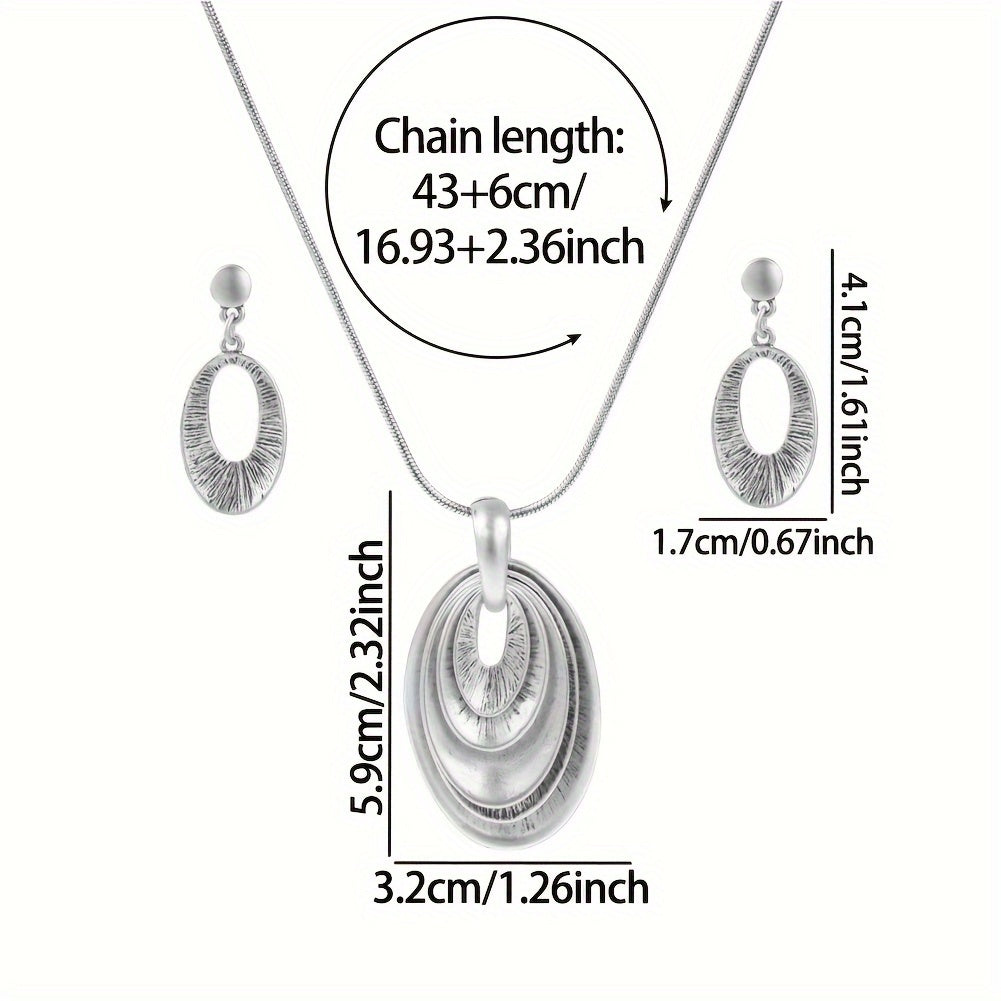 Zilveren ketting- en oorbellenset met gelaagde ovale hanger