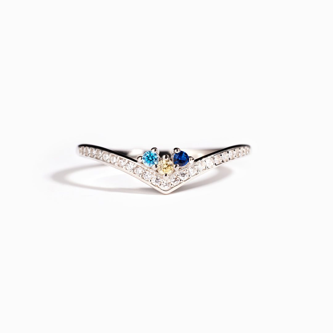 Zilveren chevron ring met blauwe geboortestenen en zirkonia