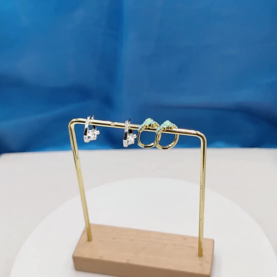 Gouden oorbellen met turquoise schildpadje