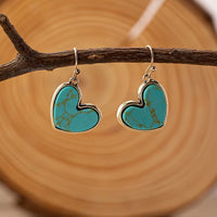 Gouden oorbellen met turquoise hart