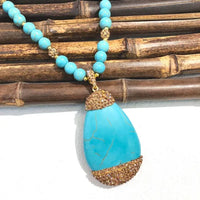 Bohemian ketting met turquoise hanger en kralen