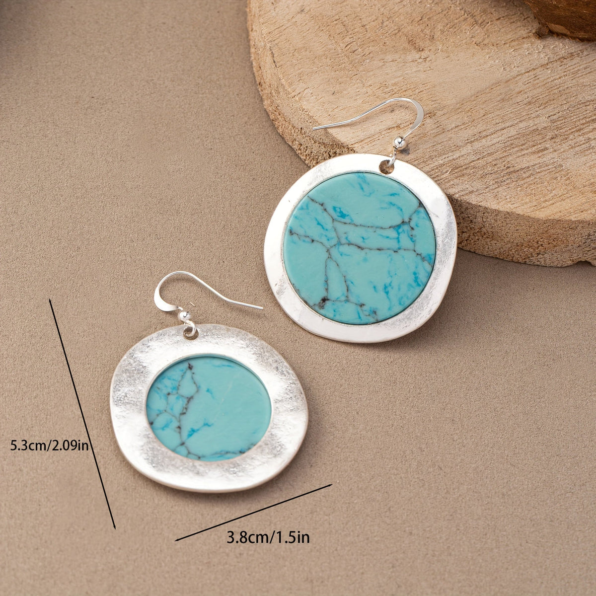 Zilveren oorbellen met ronde turquoise schijf