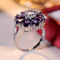 Zilveren ring met paarse en witte zirkonia bloem