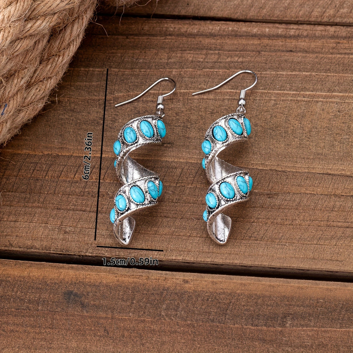 Zilveren oorbellen met spiraal en turquoise