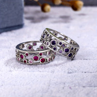 Brede zilveren ring met blauwe en witte zirkonia