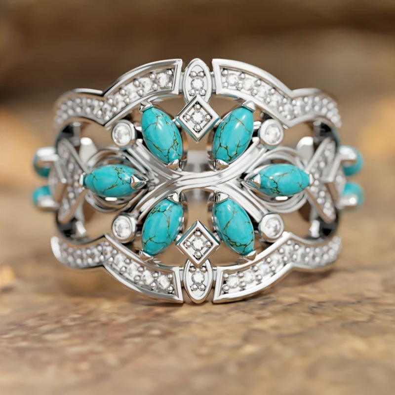 Zilveren statement ring met turquoise en kristal