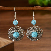 Zilveren bohemian oorbellen met filigraan en turquoise