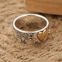 Zilveren ring met gouden hartjes en liefdesboodschap
