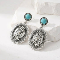 Western zilveren concho oorbellen met turquoise