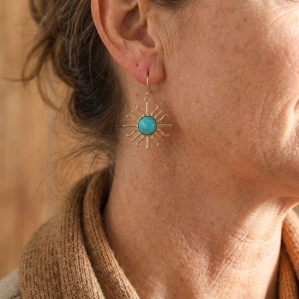Gouden bohemian oorbellen met turquoise zon