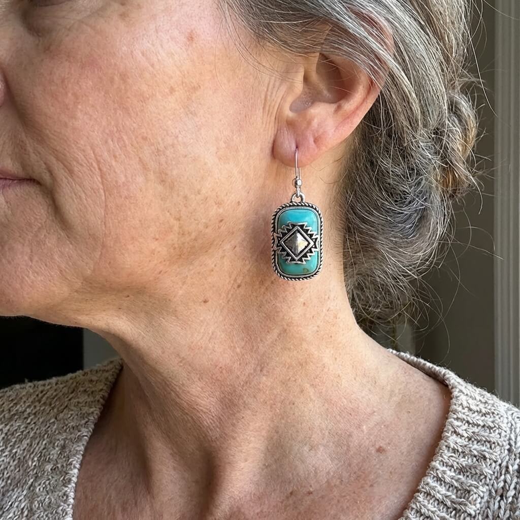 Bohemian zilveren oorbellen met turquoise en Azteeks motief