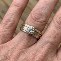 Zilver-gouden ringenset met heldere kristalsteen