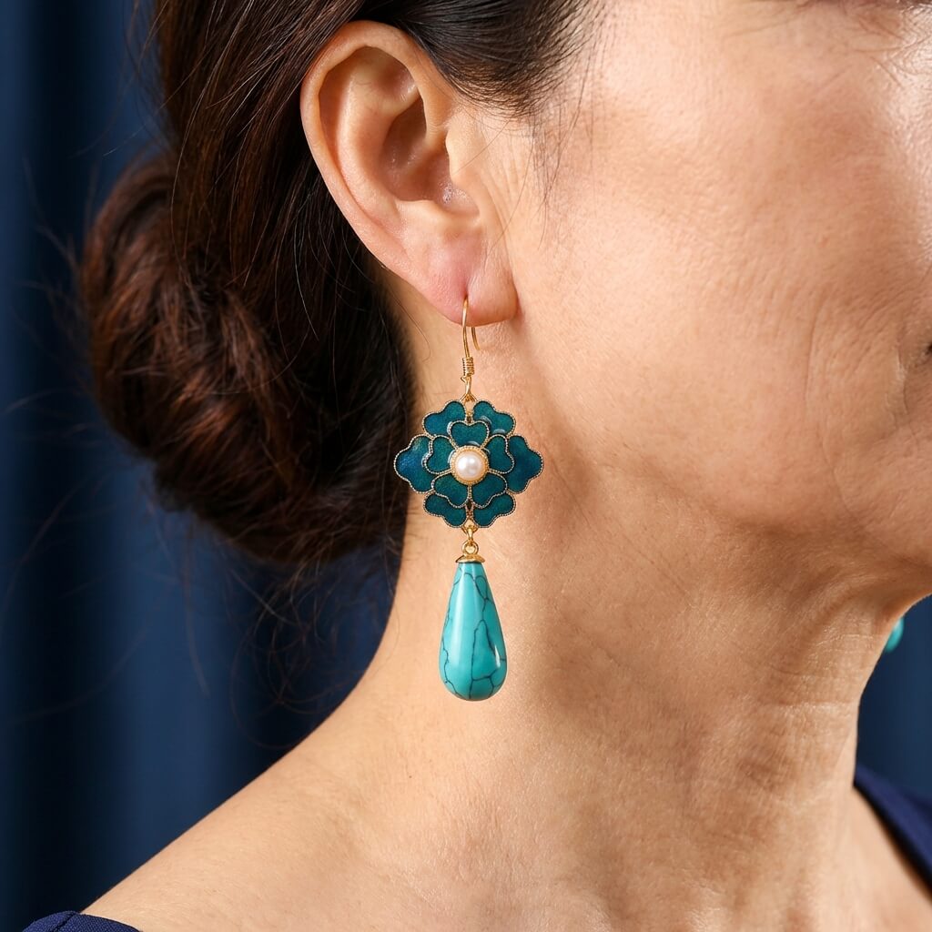 Vintage oorbellen met turquoise bloem en druppelhanger