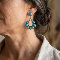 Zilveren bohemian oorbellen met turquoise waaier