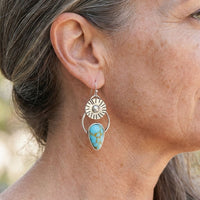 Zilveren vintage oorbellen met turquoise en zonnestraal