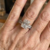 Zilveren ringenset met emerald-geslepen zirkonia en pavé band
