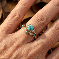 Gouden vintage ring met turquoise bloemmotief