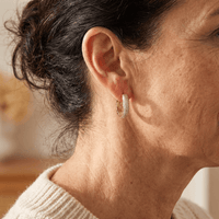 Gouden ovale oorbellen met zirconia pavé