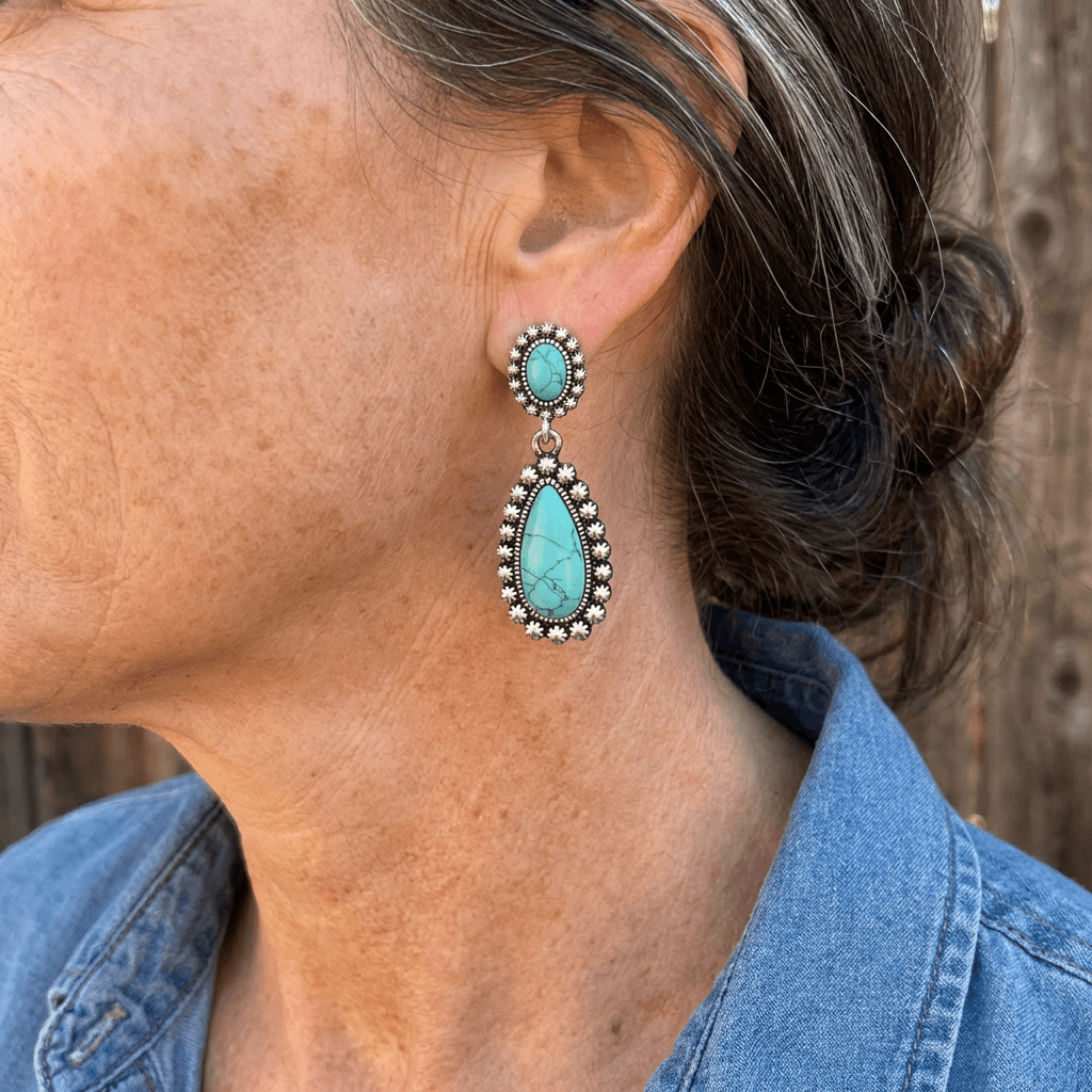 Zilveren oorbellen met turquoise druppels