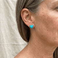 Zilveren hartvormige oorbellen met turquoise