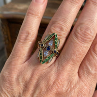Gouden ring met groene libelle en blauwe stenen