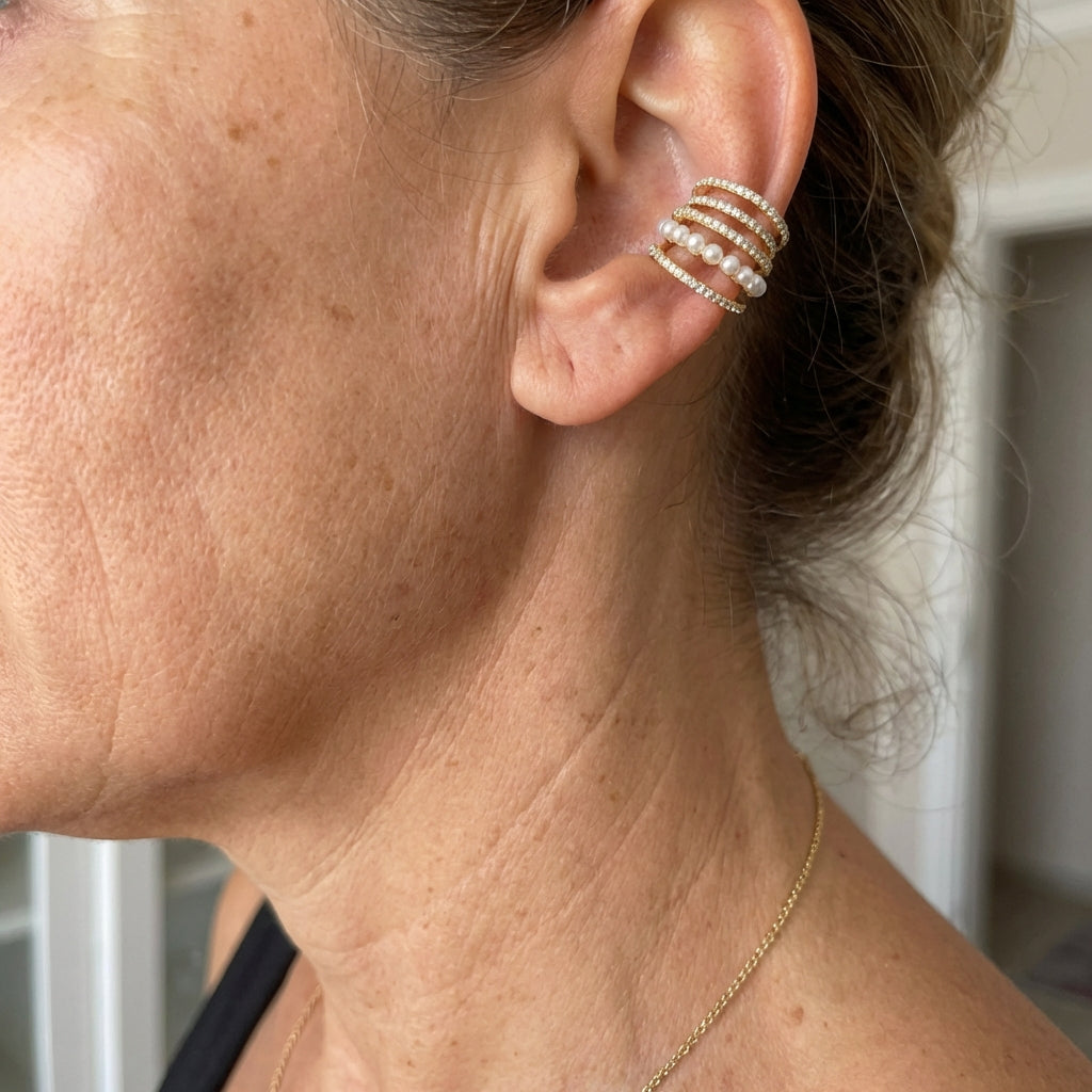 Gouden ring met parels en zirkonia in spiraalvorm