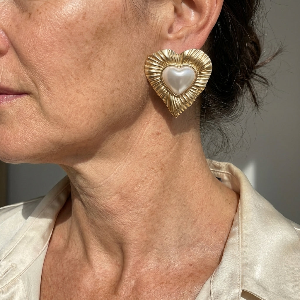 Gouden vintage hartoorbellen met parel
