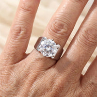 Zilveren ring met bloemen en blad in laagjes