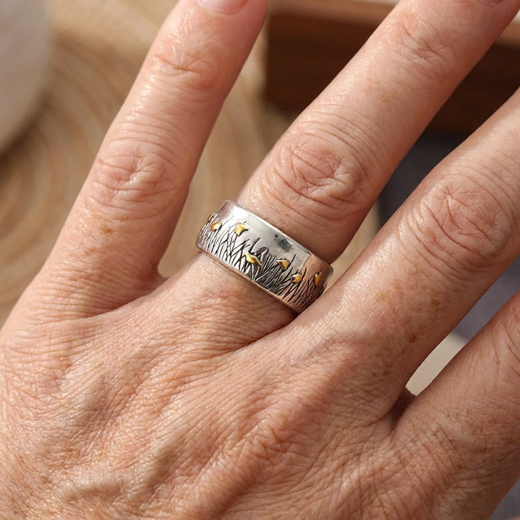 Zilveren vintage ring met gouden vogels en bladeren