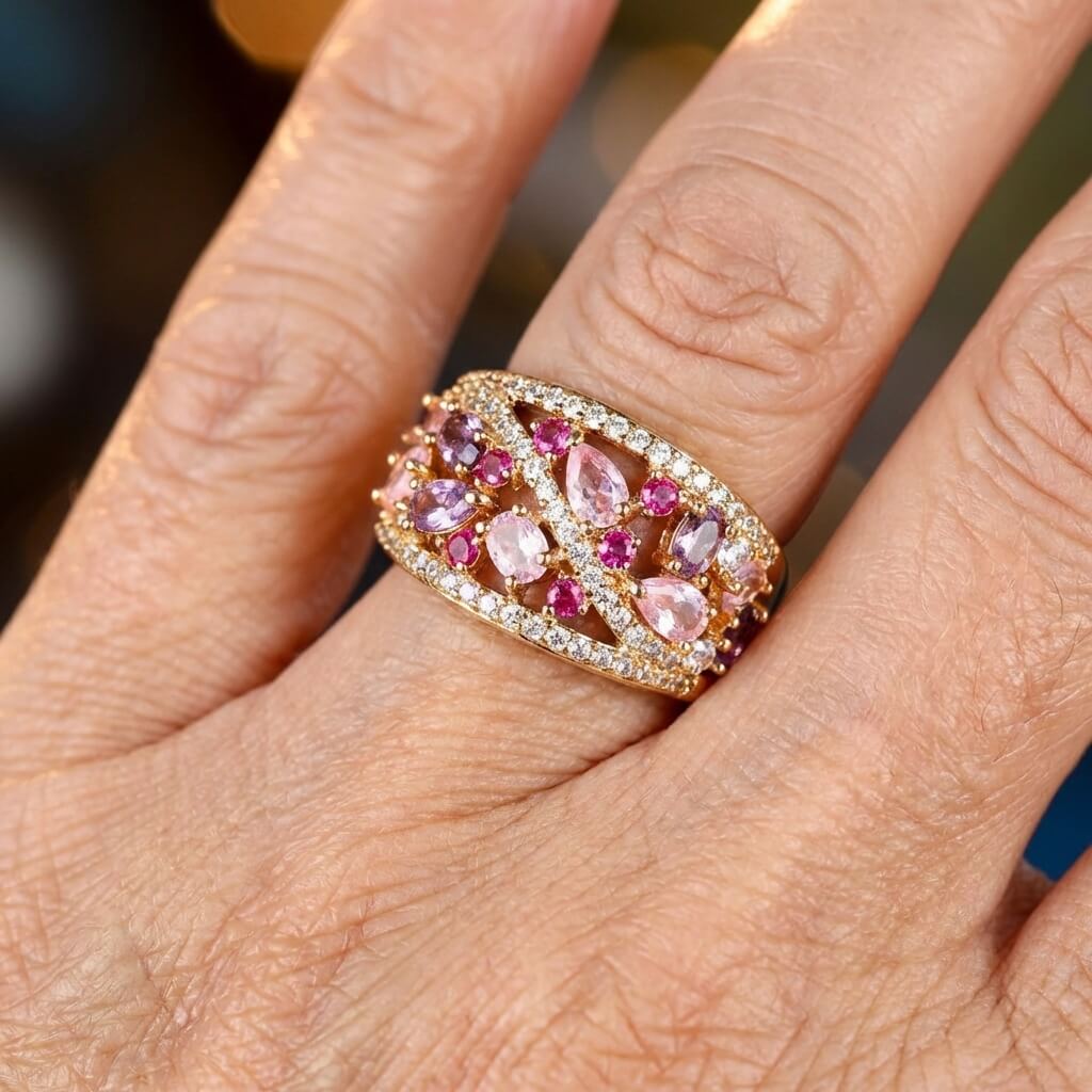 Gouden cocktailring met roze en paarse edelstenen