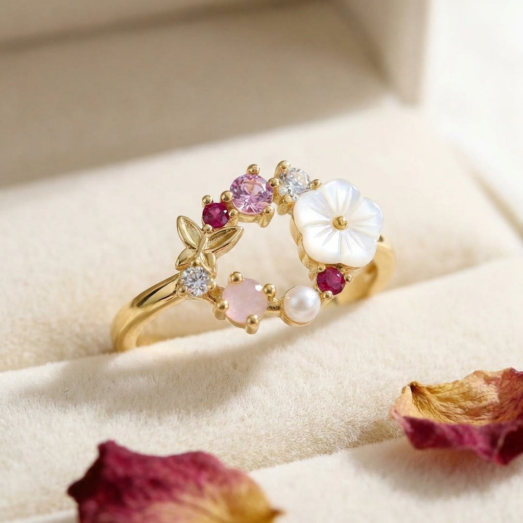 Roségouden ring met bloemkrans, parel en gekleurde zirkonia