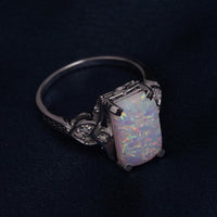 Zilveren vintage ring met rechthoekige opaal