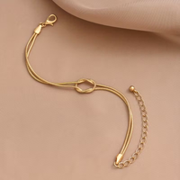 Gouden armband met minimalistische knoop