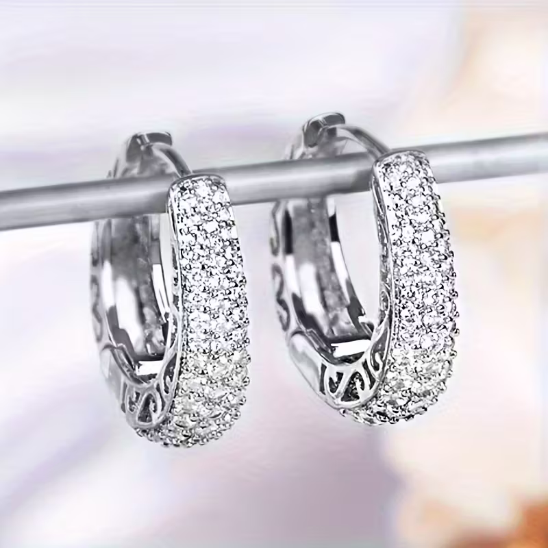 Gouden ovale oorbellen met zirconia pavé