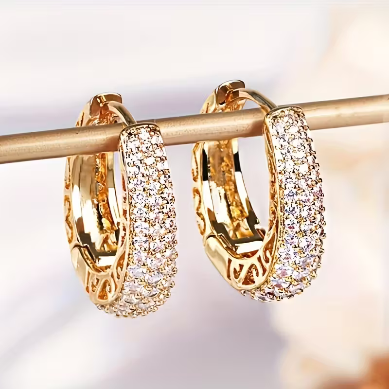 Gouden ovale oorbellen met zirconia pavé