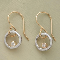 Zilveren en roségouden oorbellen met diamant