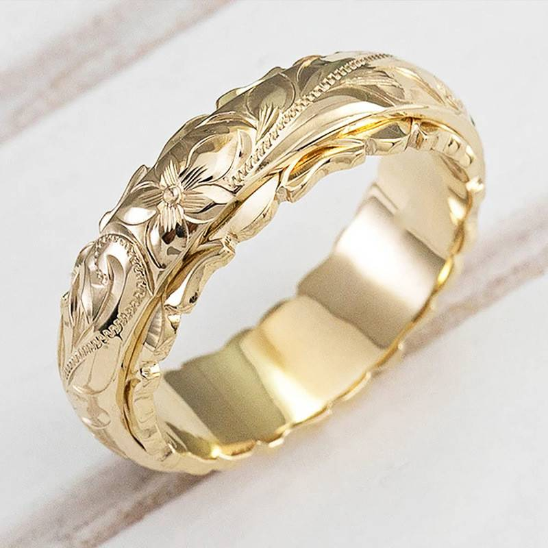 Gouden vintage ring met bloemgravering