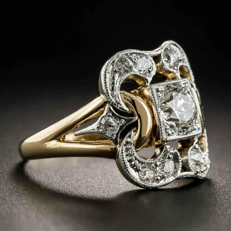 Zilveren ring met gouden vogel en opaalsteen