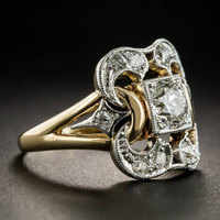 Zilveren ring met gouden vogel en opaalsteen
