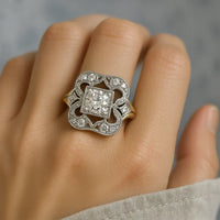 Zilveren ring met gouden vogel en opaalsteen